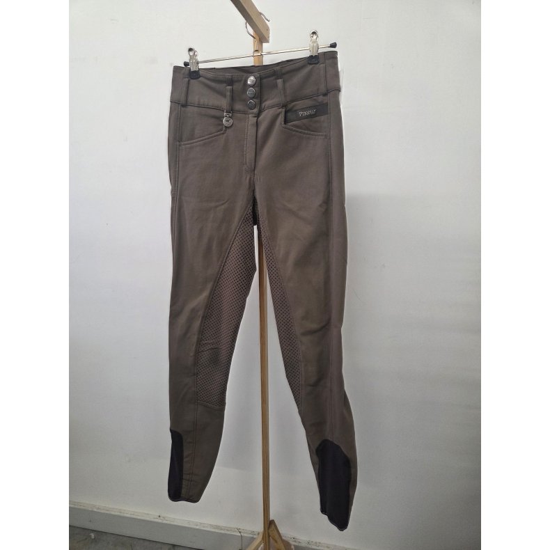 Pikeur Candela ridebukser med grip. Beige. Str. 72. Velholdt dog med afsmitning fra sort sadel p� bagdelen og ved kn�ene. Nypris 1649 kr.